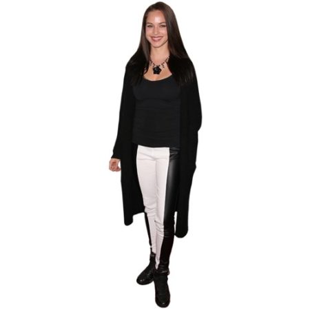 A Lifesize Cardboard Cutout of Alexis Knapp wearing trousers